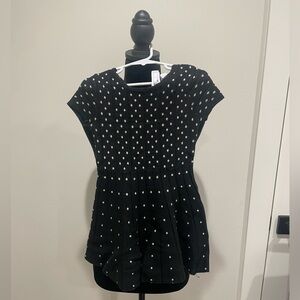 Adorable black sweater dress with gold dots.